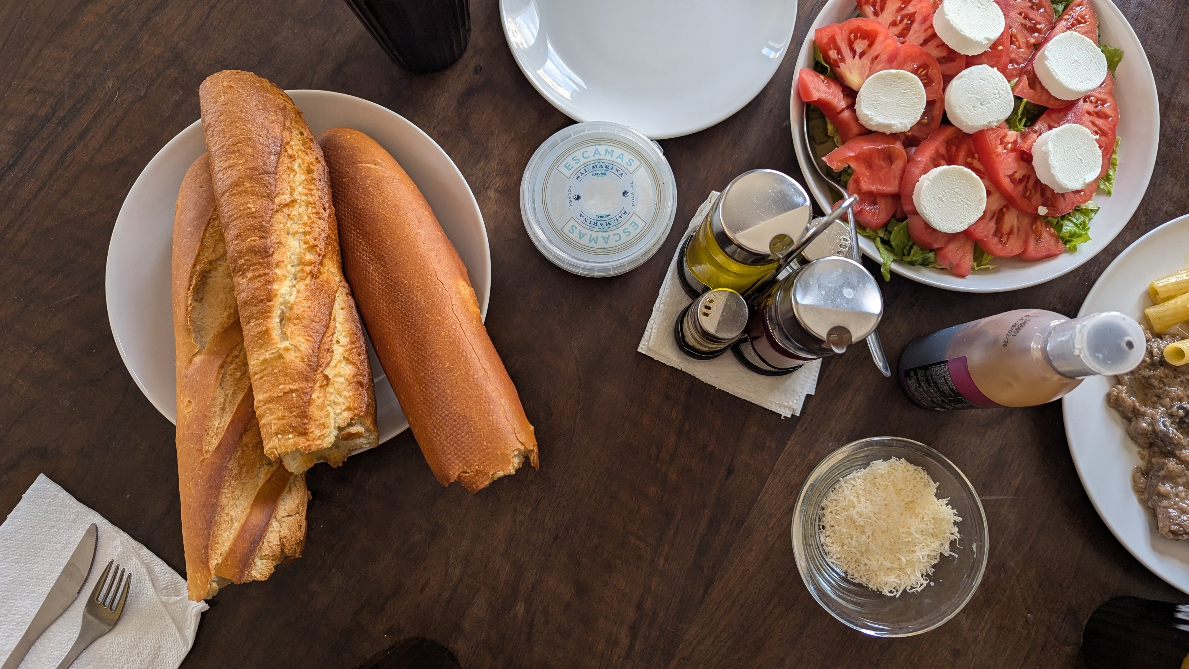 delicious, fresh, abundant food - bread, fresh veggies, olives, cheese, wine, and more!